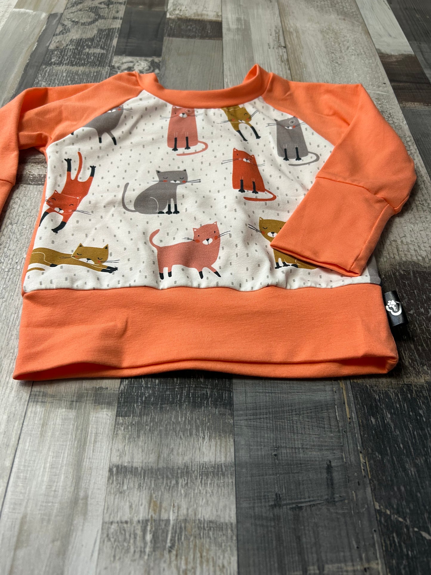 Crewneck évolutif chat corail pâle